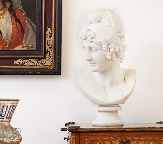 A 19TH CENTURY MARBLE BUST OF PARIS AFTER